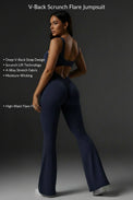 Navy blue jumpsuit worn by a person on a white background