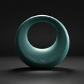 Teal 4kg kettlebell on a dark background