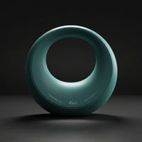 Teal 4kg kettlebell on a dark background